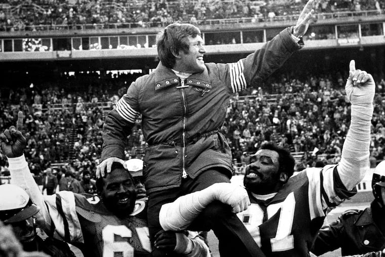 Fomer Eagles coach Dick Vermeil is carried off the field by Charlie Johnson (No. 65) and Claude Humphrey (No. 87) folllowing the team’s 1981 NFC championship victory over the Dallas Cowboys.