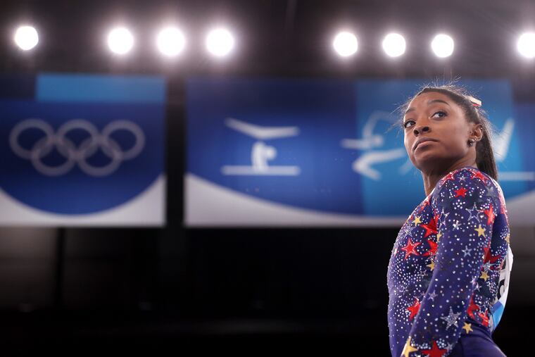 Simone Biles of the United States looked on during women's qualification on Day 2 of the Tokyo Olympics on Sunday.