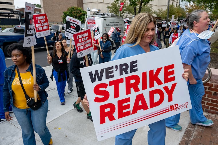 Pickets, including “Strike Ready” sign, outside Temple University Hospital on North Broad Street Sept. 10, 2025 as the Pennsylvania Association of Staff Nurses and Allied Professionals, which represents the health system’s nurses and techs, hold a protest amid negotiations for a new three-year contract.