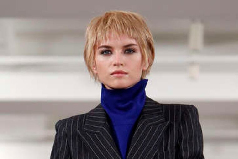 By Oscar de la Renta, menswear-like pinstripes. JASONDeCROW / AP