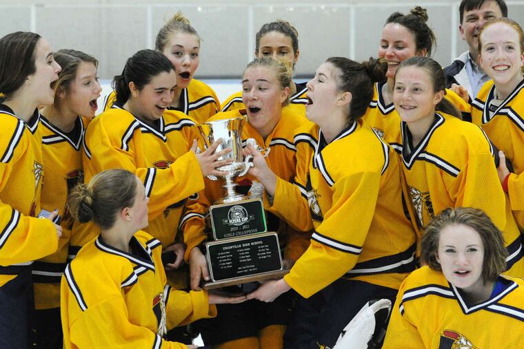 Unionville girls celebrate their fourth consecutive Flyers Cup after beating Downingtown East, 3-0, in the final at the Ice Line Quad Rinks in West Chester.
