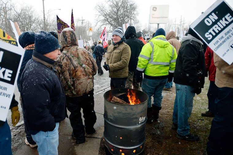Wabtec Corp. employees, who are members of UE Local 506, strike near the west gate of the former GE Transportation plant, now owned by Westinghouse Airbrakes Technologies Corp., in Lawrence Park Township, Erie County, Pa., on Tuesday, Feb. 26, 2019. Leaders of UE Locals 506 and 618 said in a statement that they were unable to convince the company to negotiate what they called an "acceptable short term agreement that preserves the wages, benefits, and working conditions" for more than 1,000 employees.