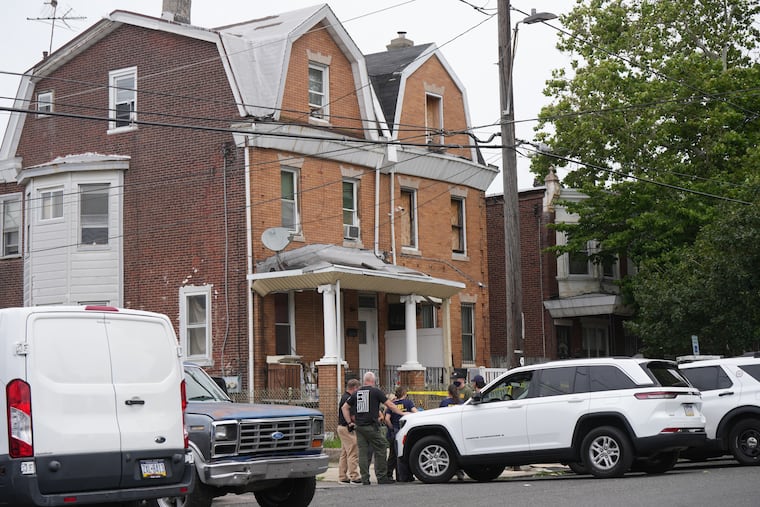Police investigating the scene on the 400 block of West Chew Avenue in Olney