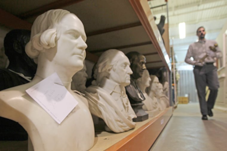 A bust of Nicholas Biddle (left) and other notables await their return to the financially strapped Atwater Kent Museum, which is closed for renovations. (Michael Bryant / Staff Photographer)