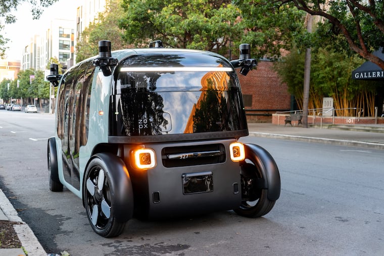 A Zoox robotaxi spotted in San Francisco in January. The Amazon-backed self-driving vehicle failed to meet safety standards because it lacks basics like a brake pedal and rearview mirrors, according to a report by federal inspectors.