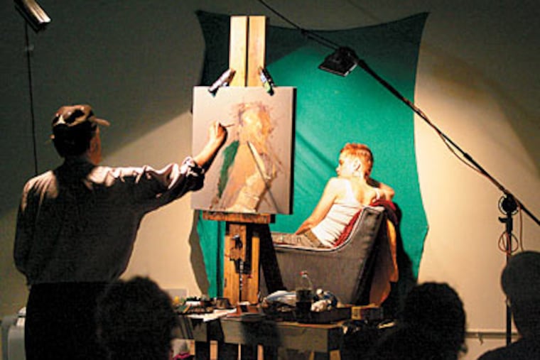 Renowned portrait artist Nelson Shanks paints Robin Frey in front of gathered students. (David Swanson / Staff Photographer)