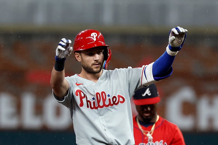 The Phillies' Trea Turner reacts after hitting a double during the first inning on Friday in Atlanta.