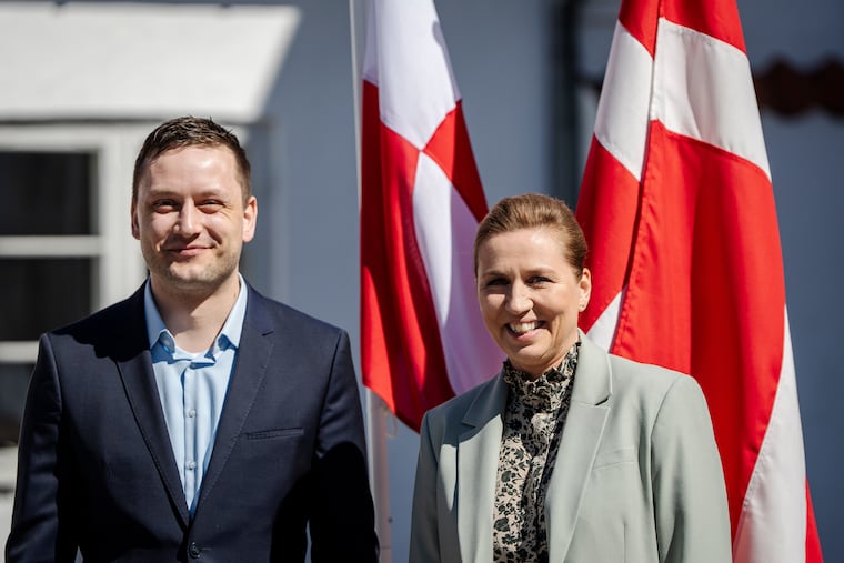Denmark's Prime Minister Mette Frederiksen, right, and Greenland's Prime Minister Jens-Frederik Nielsen issued a joint statement saying the U.S. "cannot annex another country."
