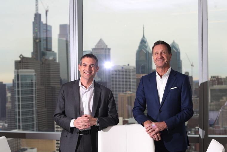 FMC CEO Pierre Brondeau (R) and lithium executive Thomas Schneberger Friday December 15, 2017. DAVID SWANSON / Staff Photographer