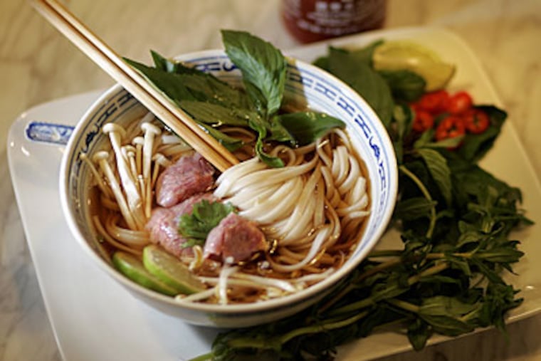 Vietnamese pho is fragrant with fresh herbs and chilies and pungent with fish sauce. (DAVID SWANSON / Staff Photographer)