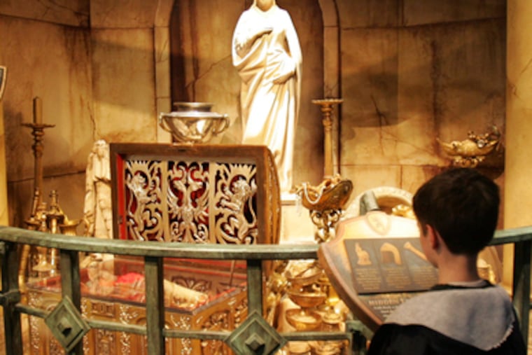 Joey McLaughlin , 7, of Oreland checks out the Franklin's "Narnia" exhibit. Kids are apt to skip educational footnotes.