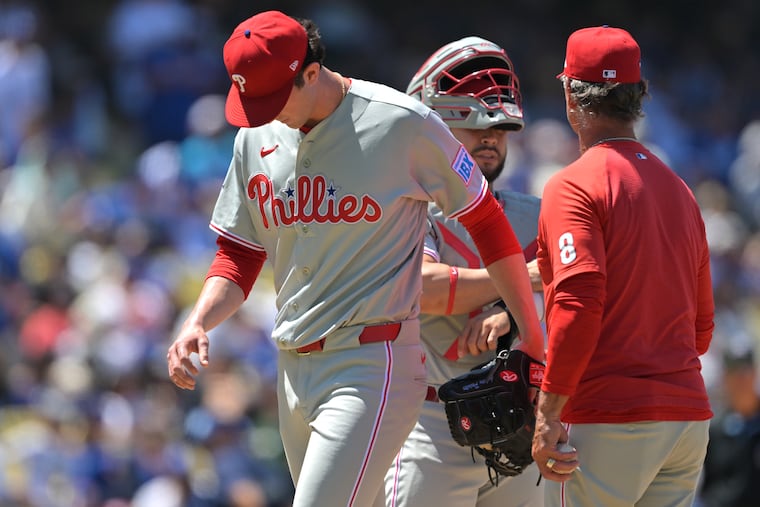Phillies interim manager Don Mattingly pulls Andrew Painter after he gave up back-to-back home runs to the Dodgers in the fourth inning on Sunday.