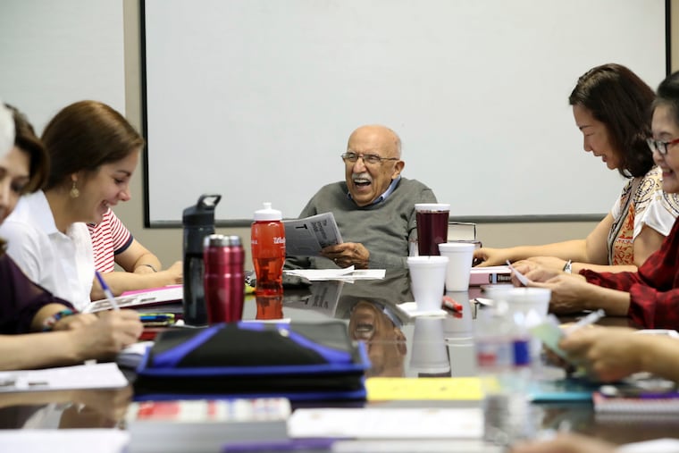Instructor Vito Susca shares a laugh with his English as a second language class at the Fort Bend Literacy Council in Sugar Land, Texas, on June 19, 2017.