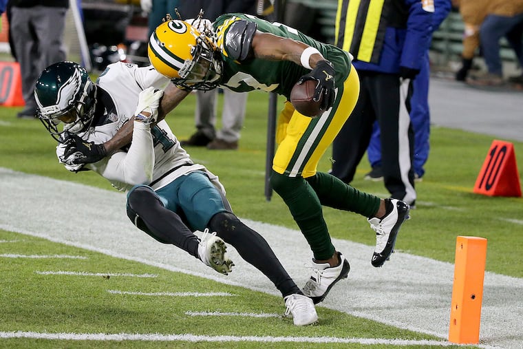 Darius Slay (left) struggled against Davante Adams and the Packers last December.