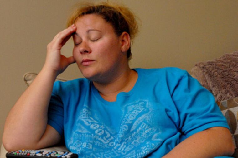 Melissa Eisele of Waterford has spent two years unsure of the fate of her house, a problem particularly in her state. (April Saul / Staff Photographer)