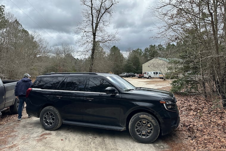 A vehicle blocks access to a property where Austin Tucker Martin lived in Cameron, N.C., Sunday, Feb. 22, 2026.