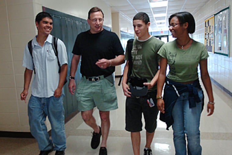 Pemberton High School students Jorge Colon, 16, (from left) with guidance counselor Vincent Palumbo, John Casciano, 17 and, Joanne Rollins, 16. (Sharon Gekoski-Kimmel / Inquirer)