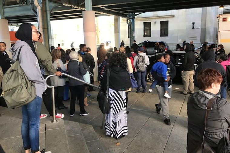 Passengers on the Market-Frankford Line train that hit and killed a man Tuesday morning waiting to be picked up by shuttle buses,