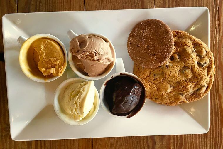 Ice creams, from left next to cookies at Metropolitan Bakery: Pumpkin, vanilla, malted milk chocolate, and a deeply intense dairy-free chocolate sorbet.