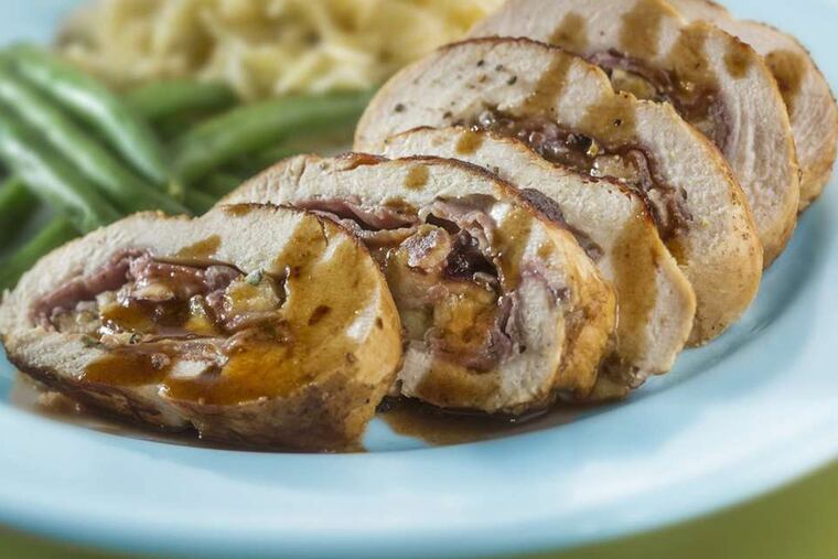 Fresh figs, prosciutto and Comte cheese fill a chicken breast, served with a simple pan sauce. (Bill Hogan/Chicago Tribune/MCT)