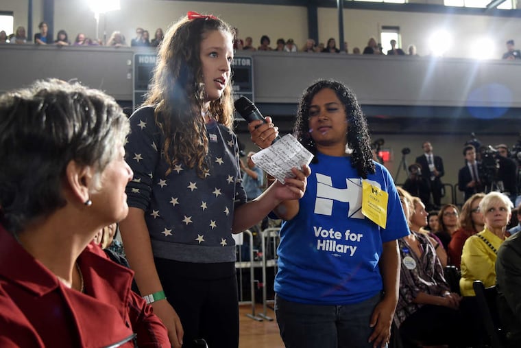Brennan Leach, 15, asks a question of Hillary Clinton during a family town hall meeting in Haverford on Tuesday.