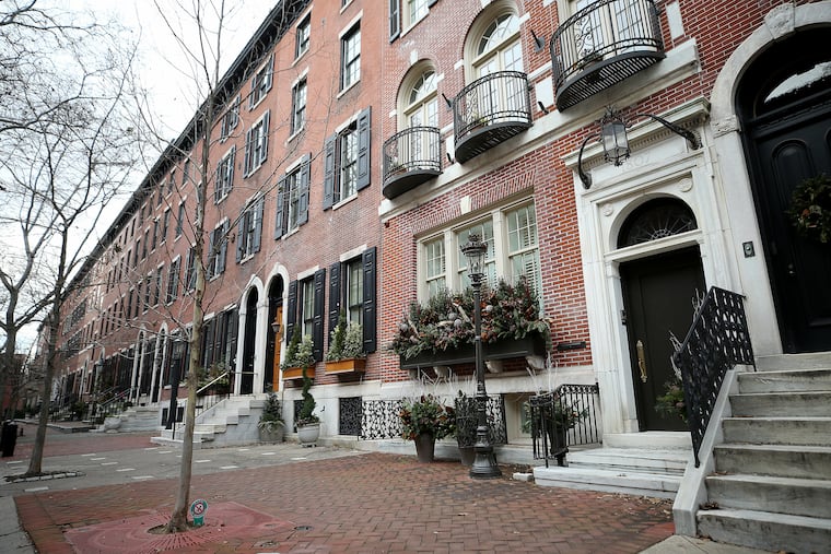 FBI agents on Thursday arrested Mikael Laferla, 20, on this bock of Delancey Place in Center City on a cyberstalking charge dating to his high school years.