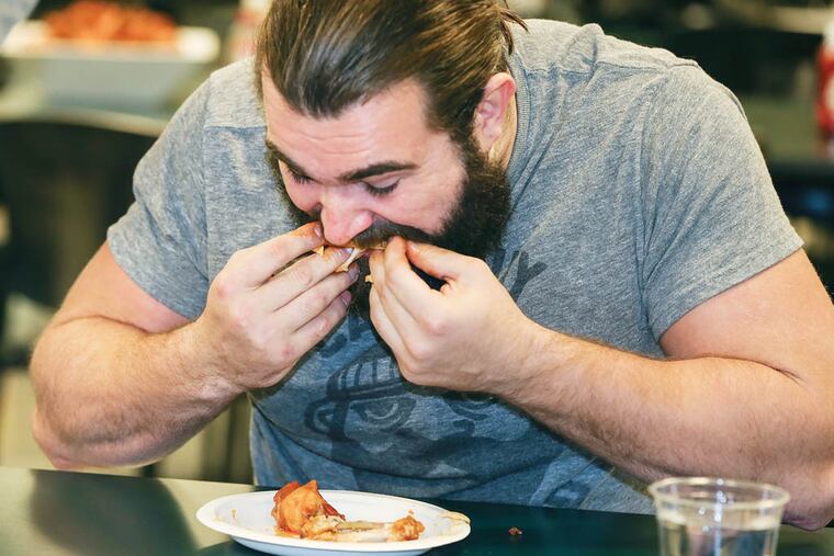 5 wings in two minutes Eagles center Jason Kelce qualifies for WIP's Wing Bowl 22 at the NovaCare Complex, Tuesday, January 28, 2014. 51 seconds to eat them. ( Steven M. Falk / Staff Photographer )