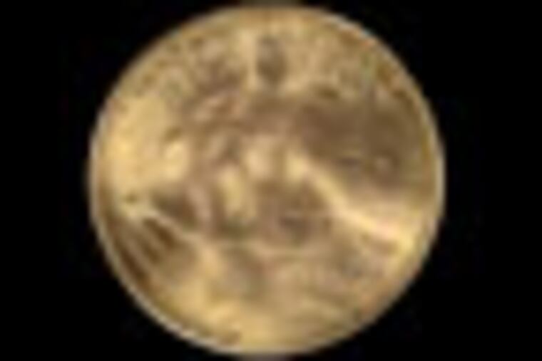 FILE - This undated file photo combination released by the U.S. Mint, shows the two sides of a 1933 "double eagle" gold coin. U.S. officials said 10 of the rare coins possessed by a Philadelphia jeweler's family were stolen from the U.S. Mint in Philadelphia in 1933. The family is fighting the U.S. in federal court, in a trial set to start Thursday, July 7, 2011, for the return of the seized coins. (AP Photo/U.S. Mint, File)