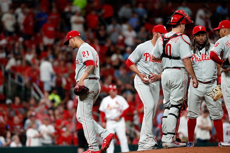 Phillies pitcher Vince Velasquez (left) is being encouraged to do less thinking, and more pitching when catcher JT Realmuto makes a call.