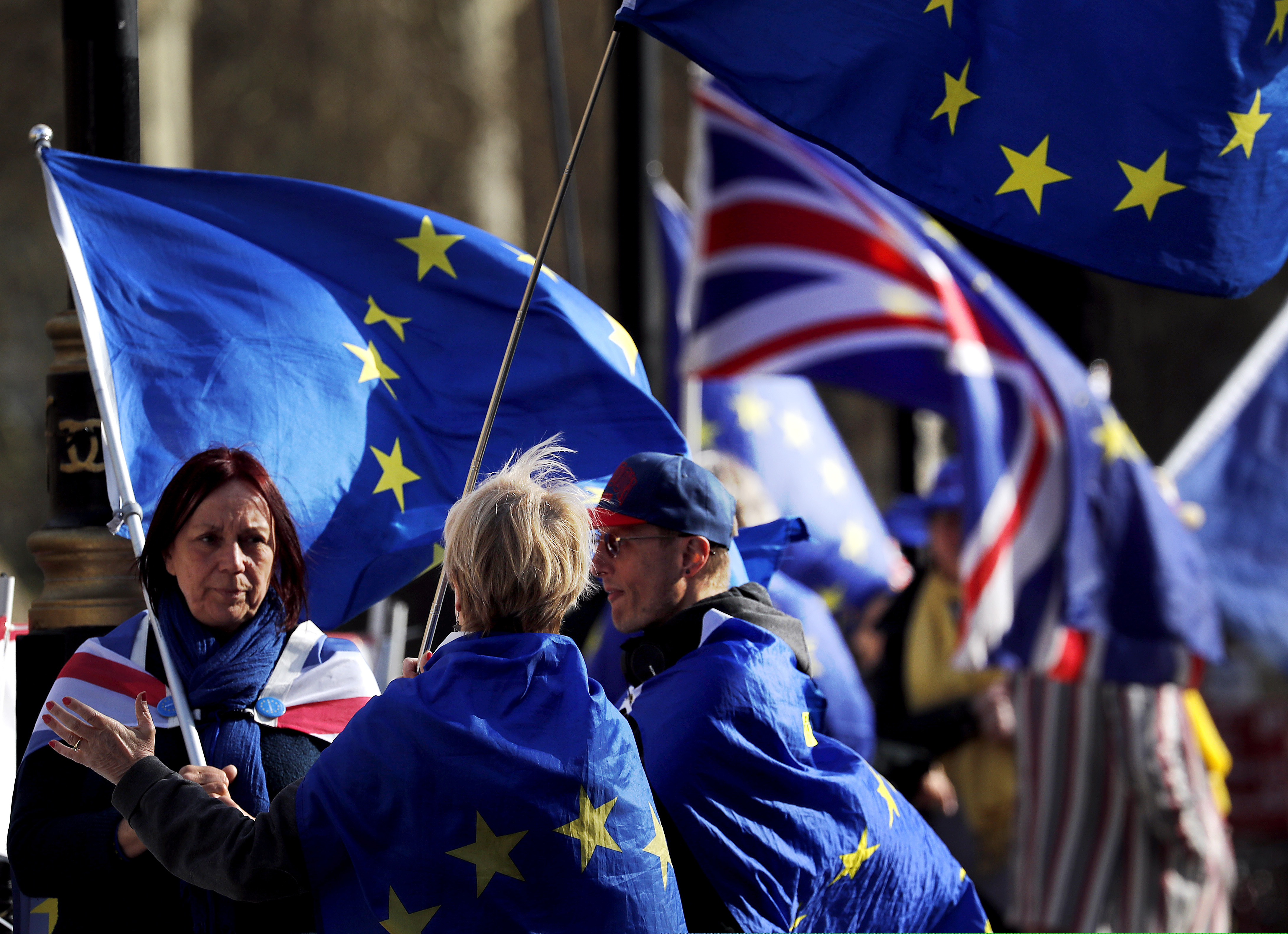Brexit protesters demonstrate near the House of Parliament in London, Tuesday, March 26, 2019. British Prime Minister Theresa May's government says Parliament's decision to take control of the stalled process of leaving the European Union underscores the need for lawmakers to approve her twice-defeated deal.