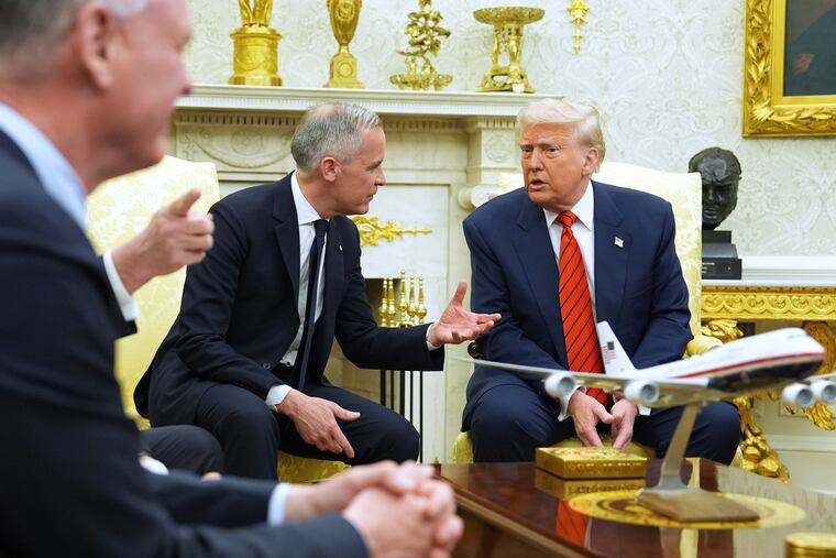 President Donald Trump meets Canadian Prime Minister Mark Carney in the Oval Office of the White House, Tuesday, May 6, 2025, in Washington. (AP Photo/Evan Vucci)