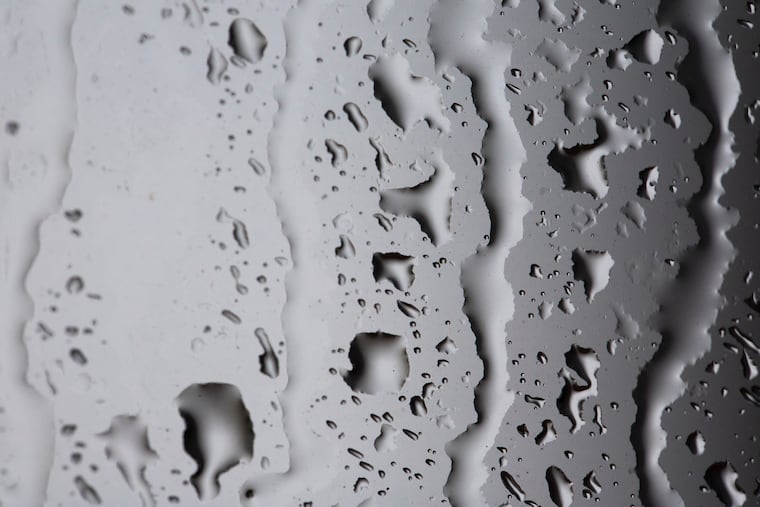 Rain collects on a car window in March. The Philadelphia area has seen an exceptionally rainy few months, including storms Wednesday that left two people killed by toppled trees.
