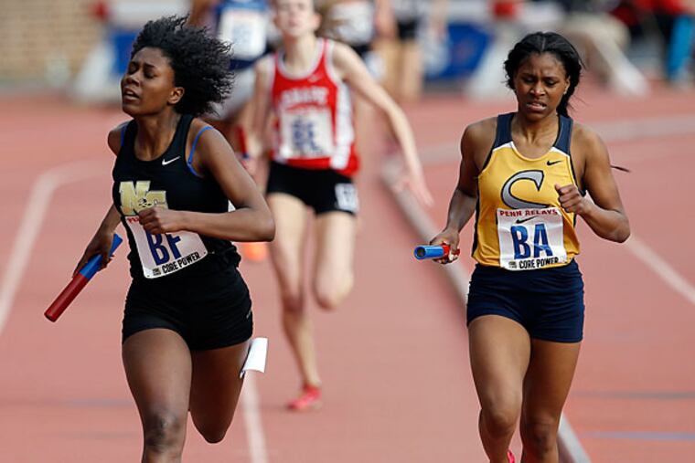 Neumann-Gorett High's Sydni Townsend (left) beats Cheltenham High's
Alexis Crosby. (Yong Kim/Staff Photographer)