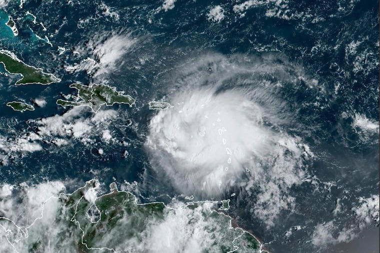 This satellite image provided by NOAA shows Tropical Storm Fiona in the Caribbean on Saturday, Sept. 17, 2022.
Fiona threatened to dump up to 16 inches (41 centimeters) of rain in parts of Puerto Rico on Saturday as forecasters placed the U.S. territory under a hurricane watch and people braced for potential landslides, severe flooding and power outages.