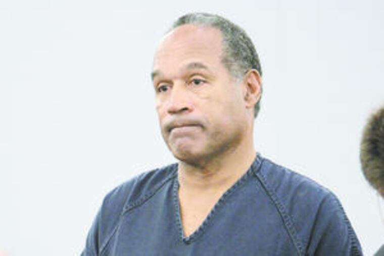O.J. Simpson was sentencedto nine to 33 years in prison yesterday for his role in an armed confrontation. Story, A3.