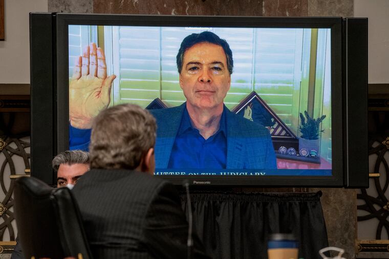 Former FBI director James Comey is sworn via videoconference before testifying during a Senate Judiciary Committee hearing on Capitol Hill in Washington in 2020 to examine the FBI "Crossfire Hurricane" investigation.