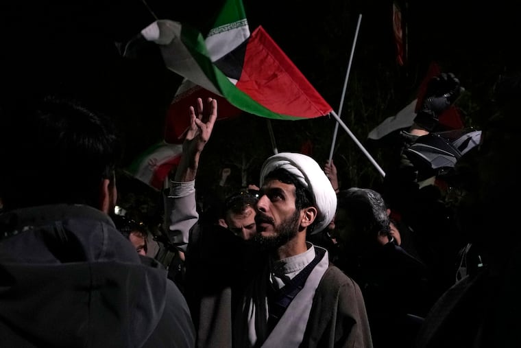 A cleric chants slogans during an anti-Israeli gathering in front of the British Embassy in Tehran, Iran, on Sunday, April 14, 2024. Iran launched its first direct military attack against Israel on Saturday.