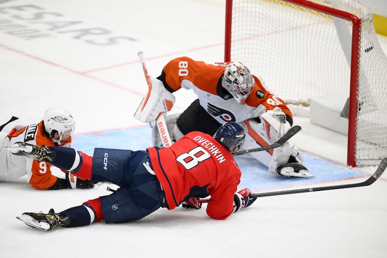 Washington's Alex Ovechkin (right) scores a goal past Flyers goaltender Dan Vladar in the third period.