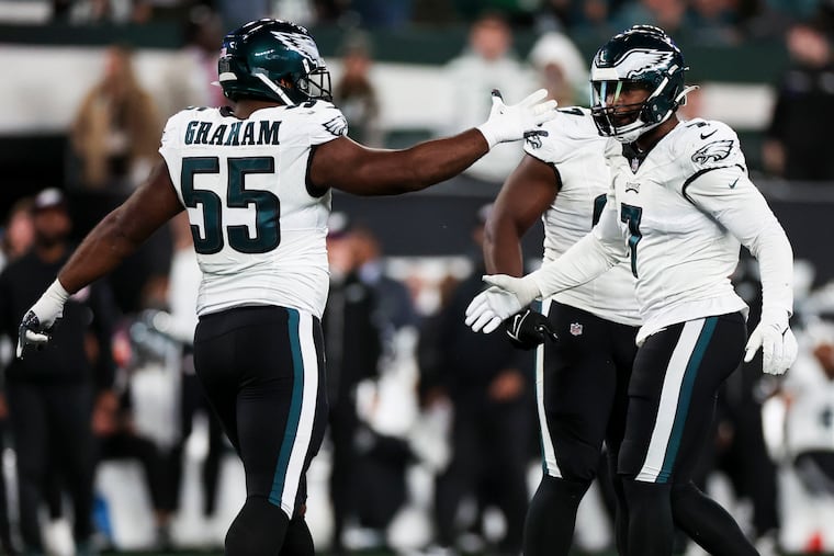 Eagles defensive end Brandon Graham celebrates with linebacker Haason Reddick after his sack during the third quarter of the game against the New York Jets at MetLife Stadium in East Rutherford, NJ on Sunday, October 15, 2023.