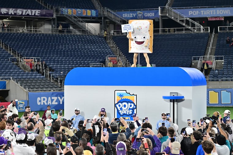 The Pop-Tart mascot looks on following the 2023 Pop-Tarts Bowl at Camping World Stadium between the Kansas State Wildcats and the NC State Wolfpack.