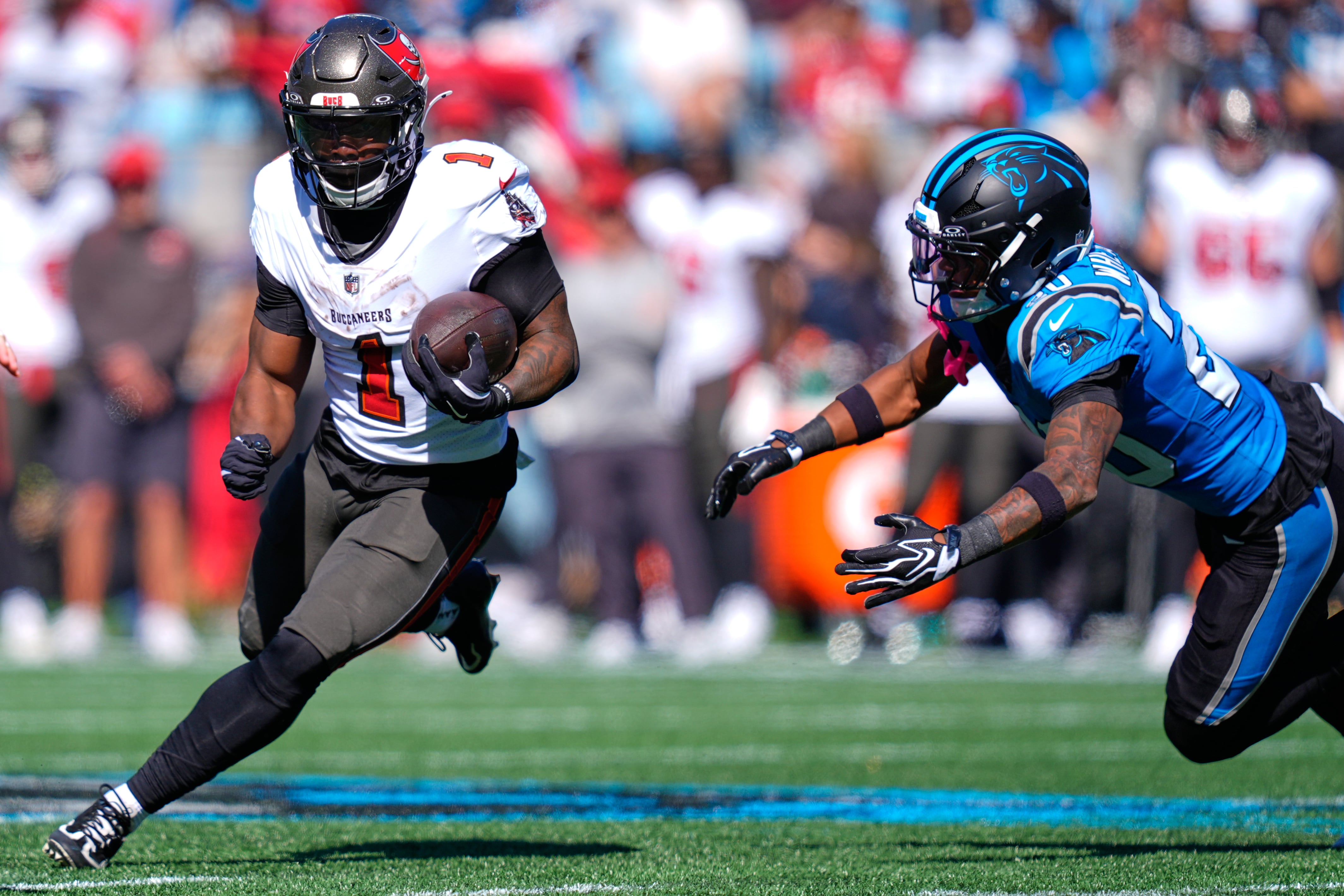 Bucky Irving runs for 2 TDs and Bucs force 4 turnovers in 43-13 rout of Panthers