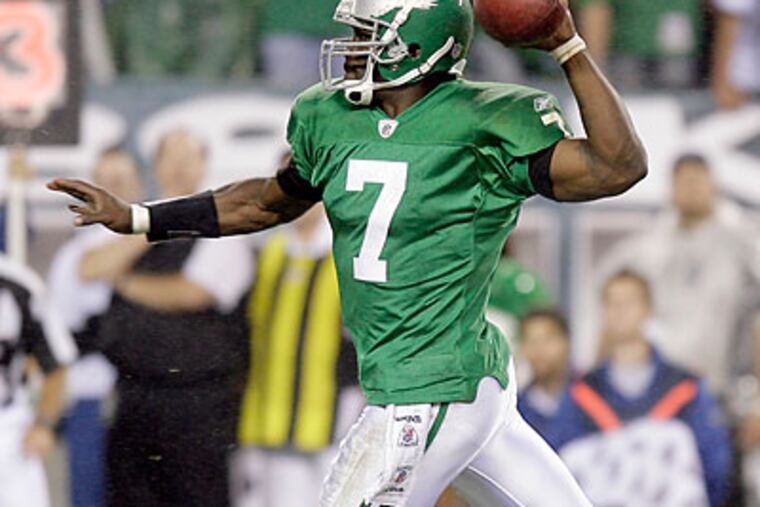 Michael Vick's performance Sunday brought back memories of Donovan McNabb for some. (Yong Kim/Staff Photographer)