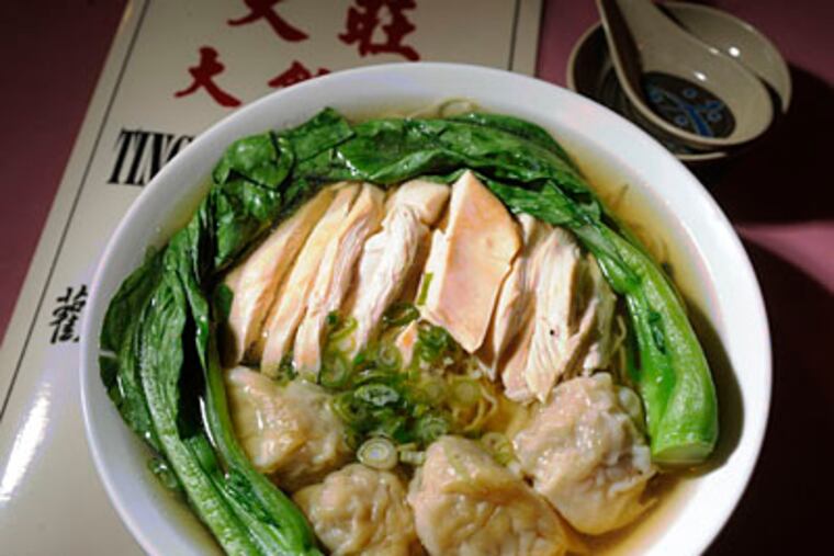 Among popular dishes offered at Ting Wong are noodle soup with signature soy sauce chicken and wontons. (CLEM MURRAY / Staff Photographer)
