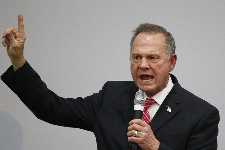 Former Alabama Chief Justice and U.S. Senate candidate Roy Moore speaks at a church revival, Tuesday, Nov. 14, 2017, in Jackson, Ala.