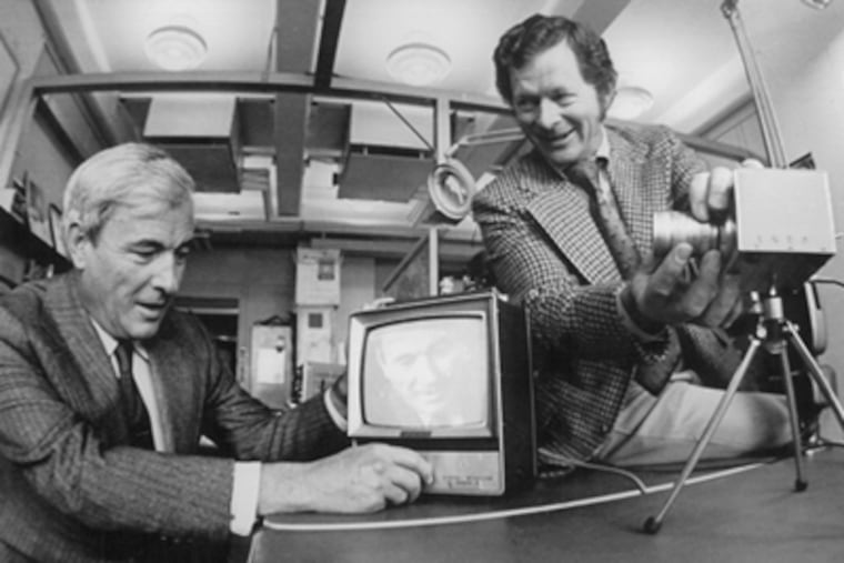 Penn grad George Smith (right) and Willard Boyle at Bell Labs in 1970 working with the device that helped them win a share of the 2009 Nobel Prize for Physics. They are demonstrating an experimental TV camera that contained their charge coupled-device instead of the vacuum tube of a conventional TV camera.