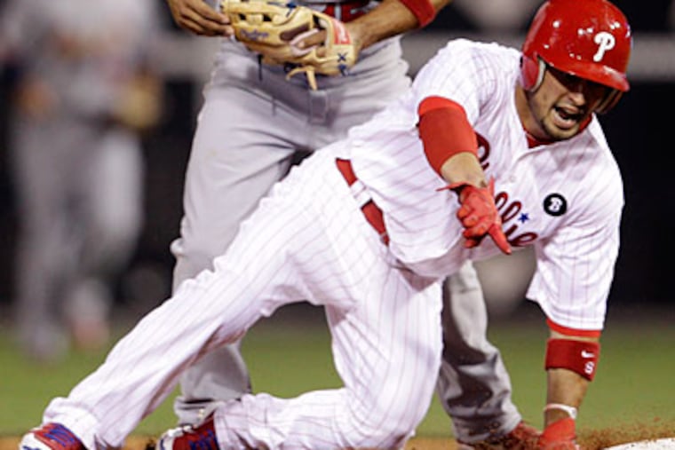 Shane Victorino leads the Phillies in runs (91) and triples (15). (Matt Slocum/AP Photo)