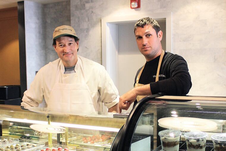 Chefs Fred Ortega (left) and Chip Roman at Tradestone Confections in Conshohocken, MICHAEL KLEIN / Philly.com