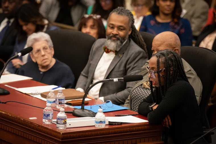 From left to right, school board member Joan Stern, board president Reginald Streater, board member Crystal Cubbage, and vice president Sarah-Ashley Andrews, listened as City Council held hearings on Mayor Cherelle Parker's school board candidates in April 2024.