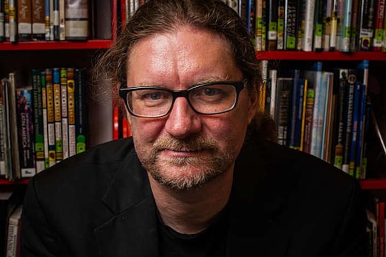 Kyle Cassidy's portraits of librarians earned him Internet fame in February. This week he plans to take 100 more for a new project. (Staff Photographer/Matthew Hall)