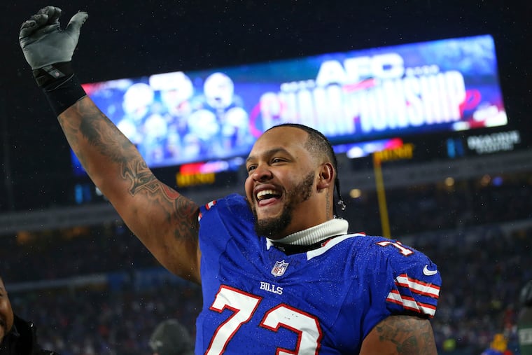 Buffalo Bills offensive tackle Dion Dawkins (73) walks off the field following the second half of an NFL football divisional playoff game against the Baltimore Ravens in Orchard Park, N.Y., Sunday Jan. 19, 2025. (AP Photo/ Jeffrey T. Barnes)